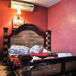 Kamer met een Queen Size Bed